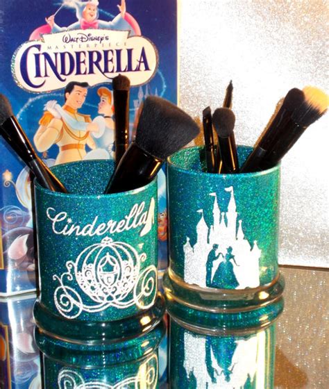 Were loving this travel-inspired makeup brush organizer. . Cinderella makeup brush holder